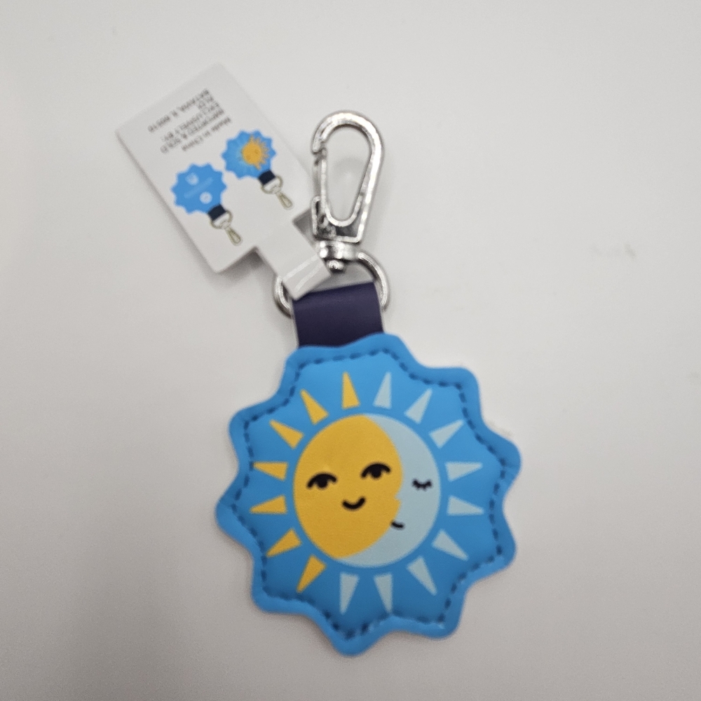 Aldi Sun and Moon Quarter Keychain